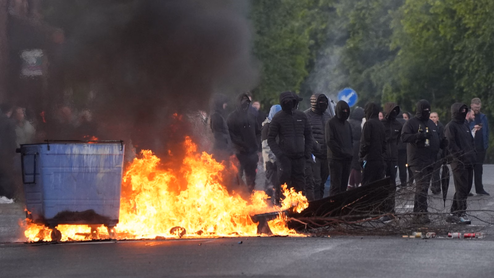 How masked mobs burned properties after knife assault