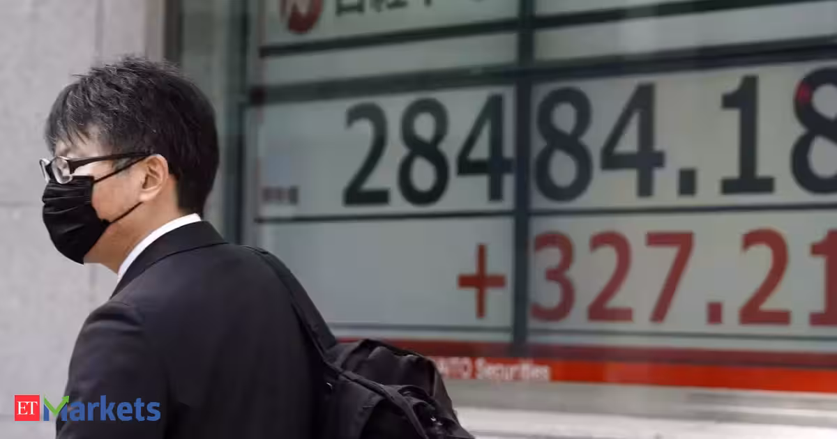 International Market At the moment: Asian shares rise following chip rally, oil slips